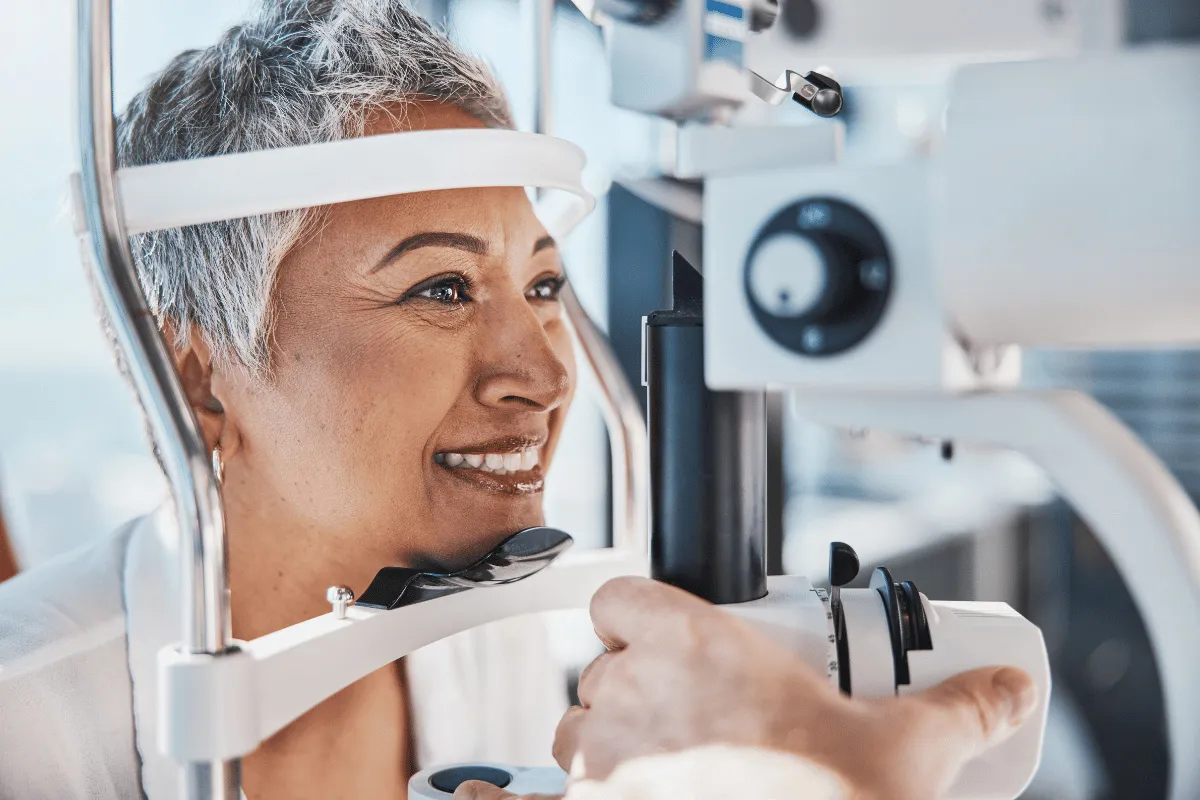 an older woman getting an eye exam